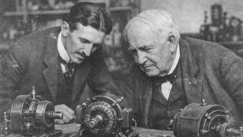 Nikola Tesla working on electrical experiments